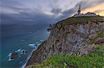 Sunrise on the cape and lighthouse of Cabo da Roca overlooking the Atlantic Ocean Sintra Portugal Europe