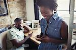 Woman texting with smart phone