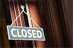 A shop doorway with a Closed sign.