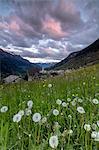 Clouds at dawn on the alpine village of Soglio, Maloja, Bregaglia Valley, Engadine, Canton of Graubunden, Switzerland, Europe
