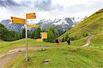 Hikers along the panoramic trail of Ferret Valley, Bertone Hut, Ferret Valley, Courmayeur, Aosta Valley, Italy, Europe