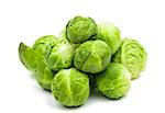 a pile of Brussels sprouts on a white background