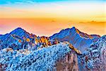 Sunrise above colorful peaks of Huangshan National park. China.