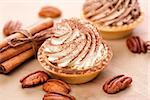 Delicious mini tarts with whipped cream and pecans.