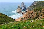 Atlantic ocean coast (granite boulders and sea cliffs) in cloudy weather. View from Cape Roca (Cabo da Roca), Portugal.