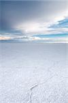 Sunset in Salar de Uyuni salt flats desert, Andes Altiplano, Bolivia