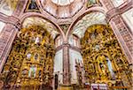 Interior of the Templo Valenciana Church showing the ornate altars with their gilded carvings, Guanajuato City, Mexico