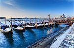 Gondolas with view to Basilica di Santa Maria della Salute after snow, Venice, UNESCO World Heritage Site, Veneto, Italy, Europe