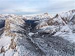 Aerial view of rocky peaks of Val Padeon and snowy woods, Cortina d'Ampezzo, Province of Belluno, Dolomites, Veneto, Italy, Europe