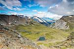 High peaks frame the alpine lakes and meadows, Filon Del Mott, Bormio, Braulio Valley, Stelvio Pass, Valtellina, Lombardy, Italy, Europe