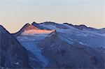 View of the Pisgana glacier and rocky peaks at dawn, Valcamonica, border Lombardy and Trentino-Alto Adige, Italy, Europe