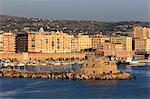 Civitavecchia and its harbour and fortifications, cruise ship port for Rome, from the sea, late afternoon sun, Civitavecchia, Lazio, Italy, Mediterranean, Europe