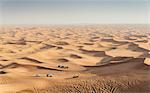 Offroad vehicles on sand dunes near Dubai, United Arab Emirates, Middle East