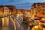 Grand Canal at night with boat light trails and moored gondolas, on the Fondementa del Vin, UNESCO World Heritage Site, Venice, Veneto, Italy, Europe