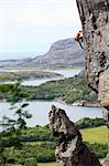 A climber scales a difficult route in the Hanshallaren Cave, Flatanger, Norway, Scandinavia, Europe