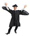 Full body excited Asian male university student in graduation gown jumping high, isolated on white background. Good Looking Southeast model.