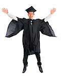 Full body excited Asian young male university student in graduation gown jumping high, isolated on white background. Good looking Southeast model.