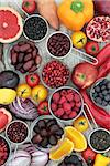 Super health food concept to promote healthy eating with fruit, vegetable, grain and pulses selection, high in antioxidants, anthocyanins, vitamins and minerals on rustic wood background.