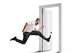 Businessman crosses a door. Concept of renewal