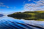 Early morning reflections in summer, Behm Canal, Misty Fjords National Monument, Tongass National Forest, Ketchikan, Alaska, United States of America, North America