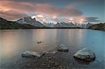 Pink clouds at sunrise on Mont Blanc massif seen from Lacs De Cheserys, Chamonix, Haute Savoie, French Alps, France, Europe