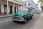 Classic 1950s Chevrolet Bel Air taxi, locally known as almendrones in the town of Cienfuegos, Cuba, West Indies, Caribbean, Central America