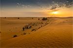 Sunrise over sand dunes in the Dubai Desert, Dubai, United Arab Emirates, Middle East