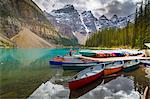 Tranquil setting of rowing boats on Moraine Lake, Banff National Park, UNESCO World Heritage Site, Canadian Rockies Alberta, Canada, North America