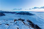 Clouds on Mount Grigna and Lake Como from mount Legnoncino, Introzzo, Valvarrone, Lecco province, Lombardy, Italy, Europe.