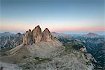 Sesto / Sexten, province of Bolzano, Dolomites, South Tyrol, Italy. The Three Peaks of Lavaredo in the twilight