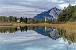 Favogna / Unterfennberg, Magrè / Margreid, province of Bolzano, South Tyrol, Italy, Europe. The lake Favogna and the church "Mary Help of Christians"