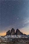 Stars above rocky peaks of Tre Cime Di Lavaredo (Drei Zinnen), Sexten Dolomites, South Tyrol, province of Bolzano, Italy