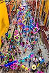 Overview of street at the St Michael Archangel Festival procession in San Miguel de Allende, Mexico