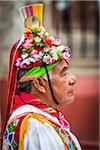 Close-up portrait of a male dancer, part of the Danza de los Voladores (Dance of the Flyers) or Palo Volador (pole flying) by the Totonac tribe at the St Michael Archangel Festival in San Miguel de Allende, Mexico