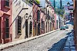 Traditional cobblestone street and buildings in San Miguel de Allende, Mexico