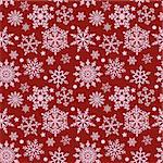 Winter pattern with snowflakes on a red background. Vector, seamless texture