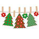 Patchwork with Christmas tree hanging on a rope in cloth pegs