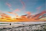 Beautiful seascape sunset over the sea with two romantic silhouette.  Australia near Perth