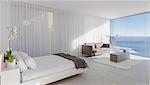 Modern, luxury home showcase bedroom with ocean view