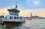 Ship moored at the pier of St. Mark's Square(Piazza San Marco) with St. George Island in the background. Venice, Veneto, Italy.