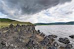 Volcanic rock formations on the shores of White Lake, Tariat district, North Hangay province, Mongolia, Central Asia, Asia