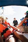 Family on boat in Bohuslan, Sweden