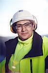 Portrait of mature woman in protective clothing