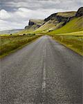 Road passing by Foss a Sidu waterfall in Iceland