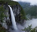 Jotunheimen mountain range and Utladalen valley with Vettisfossen waterfall