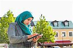 Muslim woman using tablet