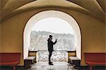 Man on balcony in Sodermanlad, Sweden
