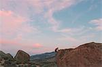 Man climbing rock in Buttermilk Country