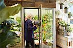 Florist working in flower shop