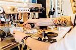 Man making coffee at bakery in Sweden